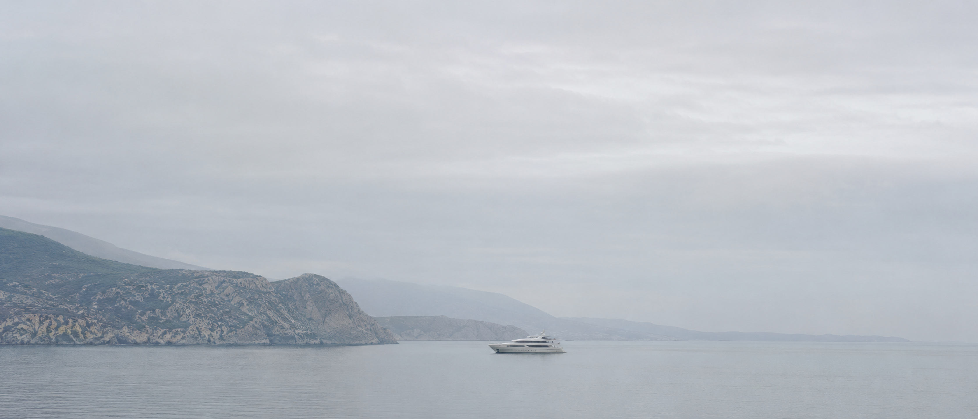 A superyacht at anchor in the Mediterranean